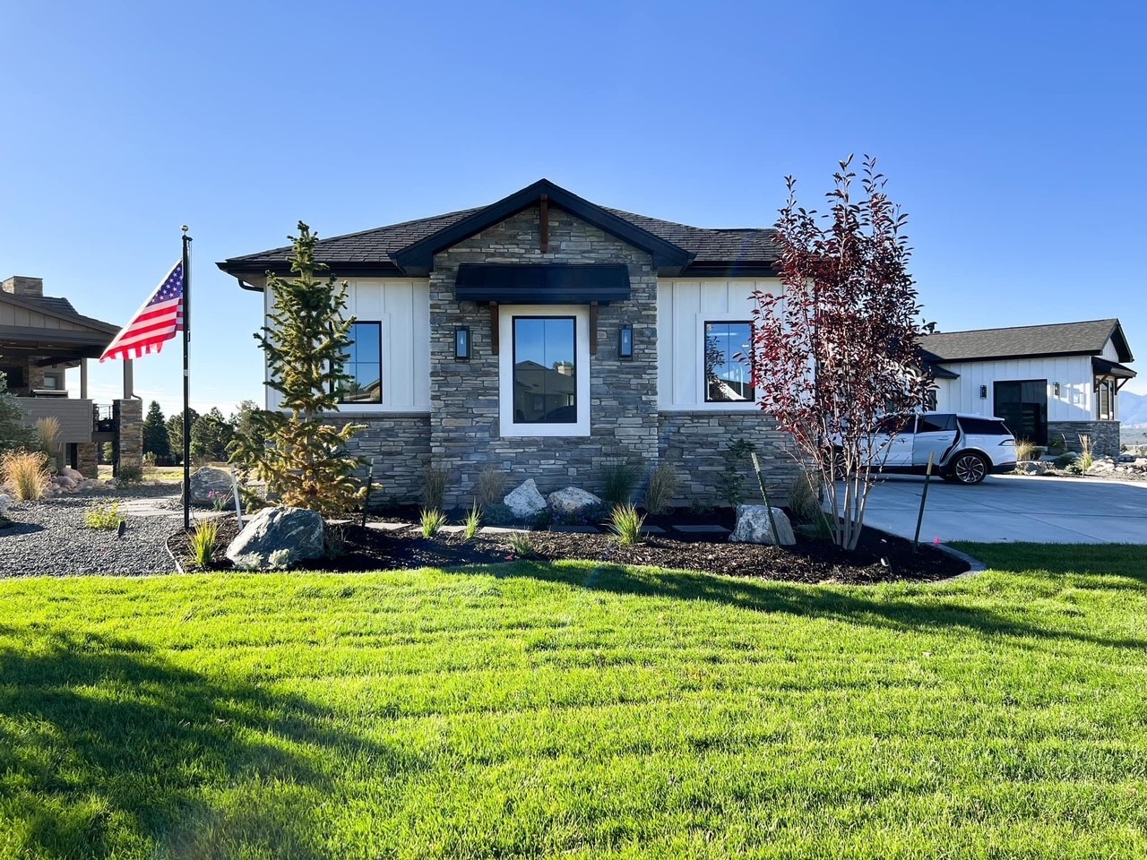spyglass hill custom home landscaped side